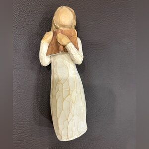 Elegant Figurine with Book